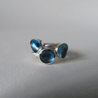 silver ring with freeform London blue topaz
