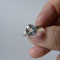 silver ring with pear white topaz