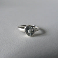 silver ring with pear white topaz