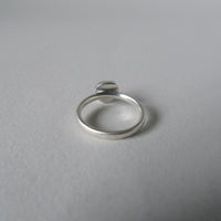 silver ring with freeform London blue topaz
