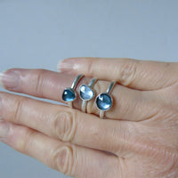 silver ring with freeform London blue topaz
