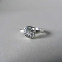 silver ring with pear white topaz