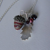 large silver oak leaf and russet swirl glass acorn necklace