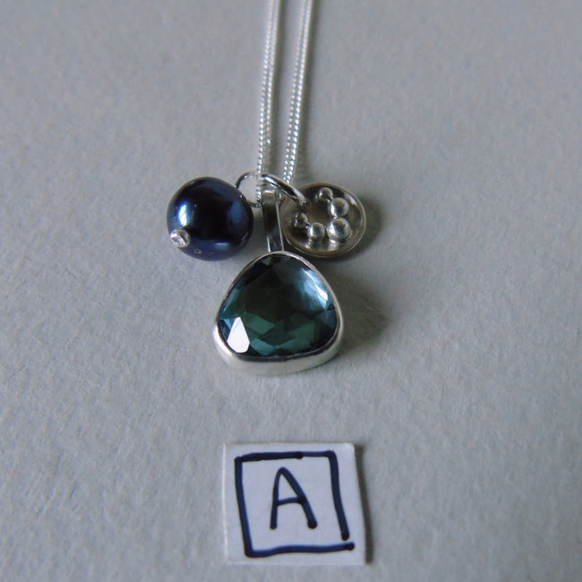 silver nighfall blue topaz necklace