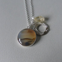 silver planet earth agate necklace