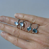 silver ring with freeform London blue topaz