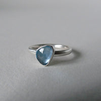 silver ring with freeform London blue topaz