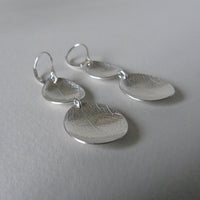 silver two larger oval leaf dish earrings