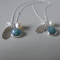 silver snowflake and frost necklaces