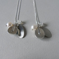 silver snowflake and frost necklaces