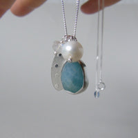 silver snowflake and frost necklaces