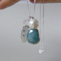 silver snowflake and frost necklaces
