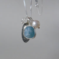 silver snowflake and frost necklaces