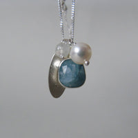 silver snowflake and frost necklaces