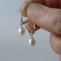 silver earrings with creamy drop pearls