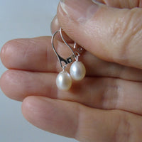 silver earrings with creamy drop pearls