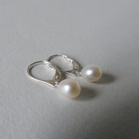 silver earrings with creamy drop pearls