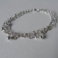 Silver chain Tangled charm bracelet