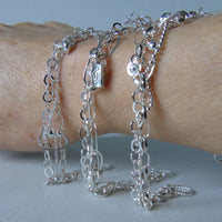Silver chain Tangled charm bracelet