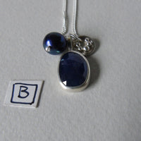 silver moonlit night sapphire necklace