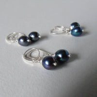 silver lever back earrings with peacock pearl drop