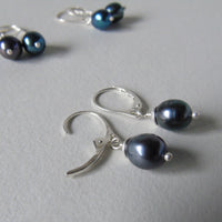 silver lever back earrings with peacock pearl drop