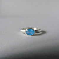 silver ring with faceted blue chalcedony