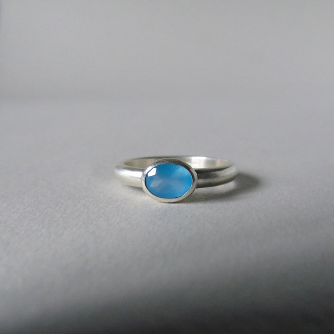 silver ring with faceted blue chalcedony