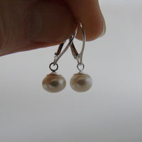 silver earrings with cream bouton pearls