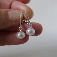silver earrings with cream bouton pearls