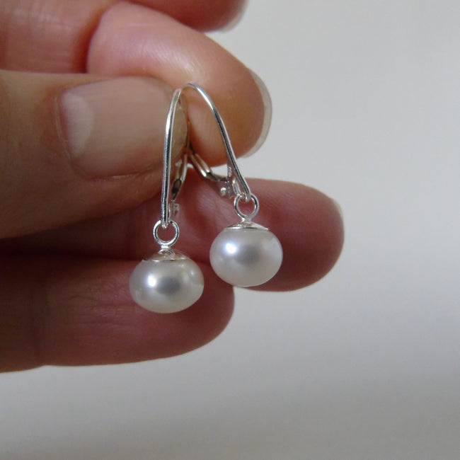 silver earrings with cream bouton pearls