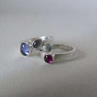 Pale iolite pair of silver cluster rings