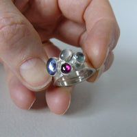 Pale iolite pair of silver cluster rings