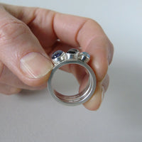 Pale iolite pair of silver cluster rings