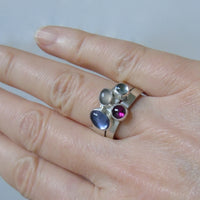 Pale iolite pair of silver cluster rings