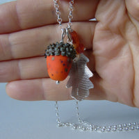 large silver oak leaf and orange glass acorn necklace