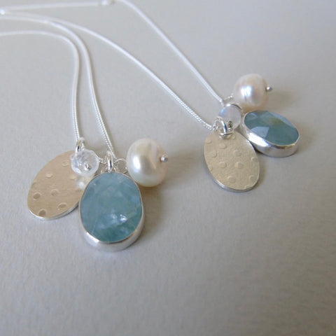 silver snowflake and frost necklaces