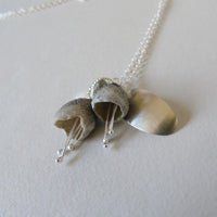 silver leaf and double porcelain pod necklace
