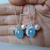 silver snowflake and frost necklaces