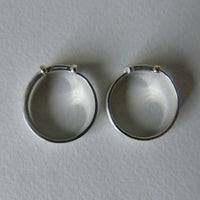 silver 'christening bangle' ring with gold detail