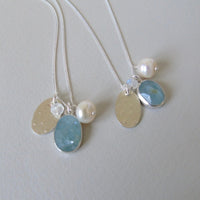silver snowflake and frost necklaces