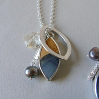 silver lone pine sunset necklaces