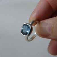 silver ring with cushion salt and pepper aquamarine