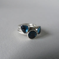 silver ring with freeform London blue topaz