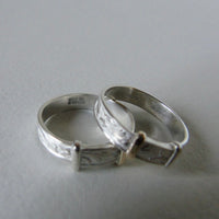 silver 'christening bangle' ring with gold detail