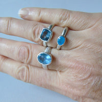 silver ring with faceted blue chalcedony