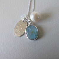 silver snowflake and frost necklaces