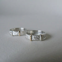 silver 'christening bangle' ring with gold detail