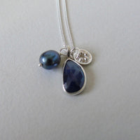 silver moonlit night sapphire necklace