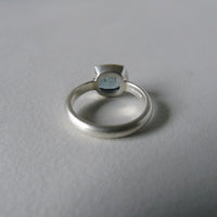 silver ring with cushion salt and pepper aquamarine